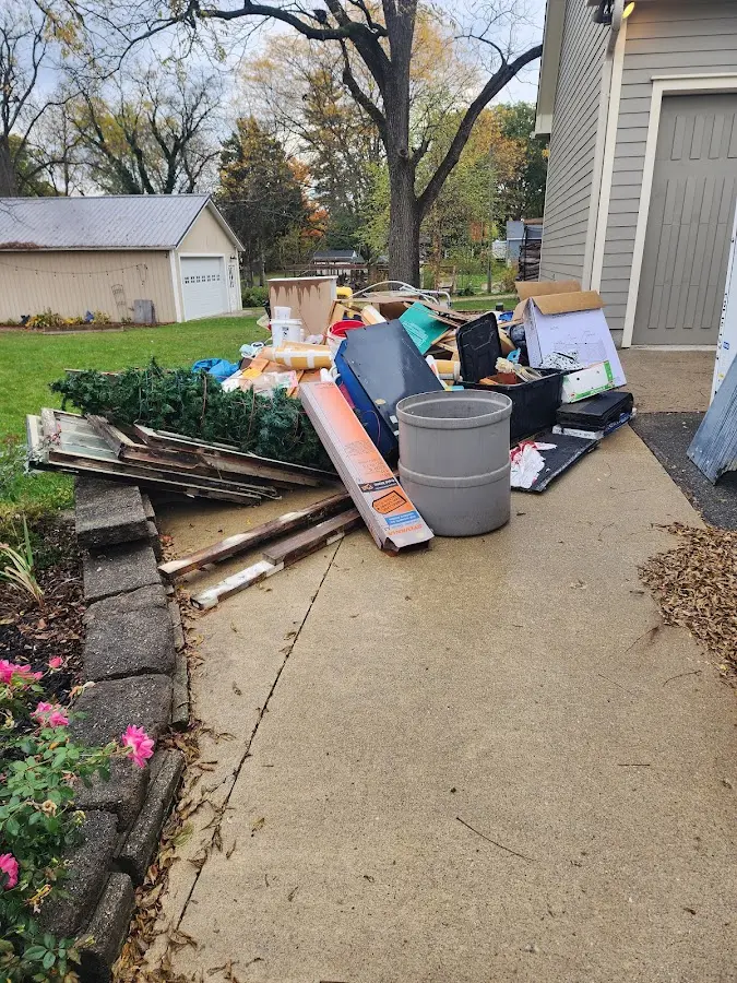 Dumpster being loaded with debris for 30 Yard Dumpster Rental in Sierra Madre